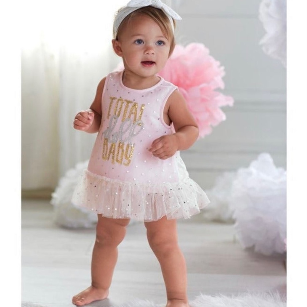 Adorable mud pie total doll. Any dress size 6-8 months